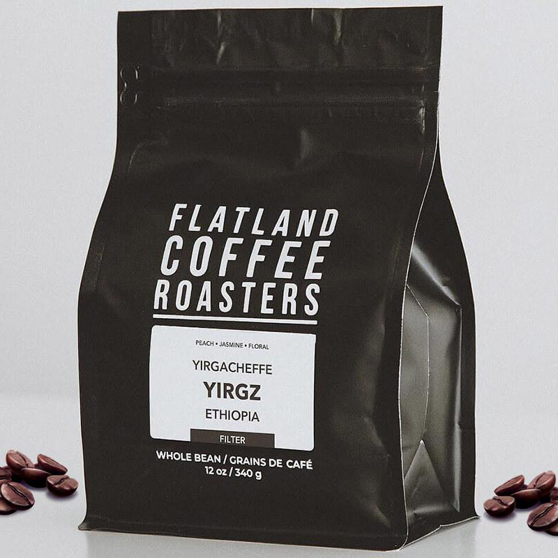 Zwarte achtergrond Koffie zijvouw met ritssluiting